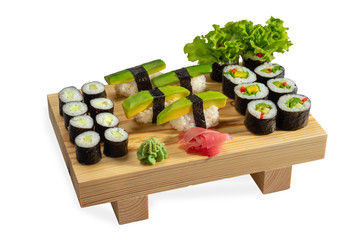 Sushi avocado set and sushi roll on wooden board isolated on white background