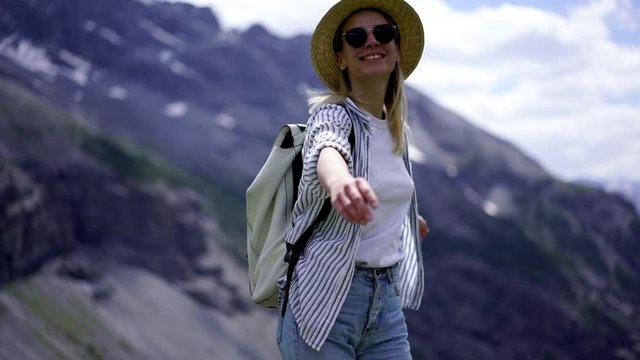 Excited Young Adventurous Woman Wanderlust Feeling Freedom On Elevation In Alps On Summer Vacation, Happy Overjoyed Millennial Female Tourist Turning Around Feeling Carefree During Travel To Mountains