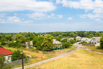 Panoramic view on Ukrainian village of Birki, Kirovograd region, Ukraine. Old stylized ethnic house in a village. Soft focus