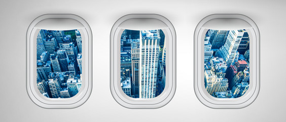 Airplane windows with New York City night view. Travel and holiday abstract concept