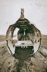 Wreckage of an old airplane abandoned on a beach