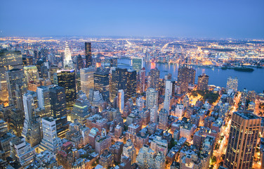 New York City, USA. Night aerial view of Midtown Manhattan skyscrapers from a high viewpoint