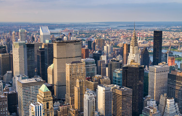 Sunset aerial view of Midtown Manhattan skyscrapers from a high viewpoint, New York City, USA