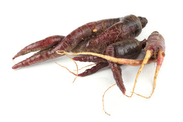 Funny ugly violet carrots