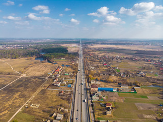 View from the drone of the asphalt road to the city. Ukraine.