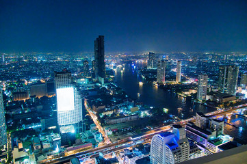 Fototapeta premium Aerial view of Bangkok Downtown Skyline at night, Thailand