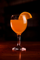 Orange Juice in the Glass at the Bar