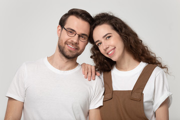 Head shot close up portrait young romantic bonding family couple.