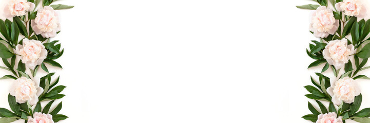 Border frame made of pink peonies and green leaves. White banner with place for text.