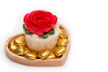 Rose cupcake and golden hearts