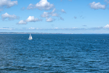 sailboat sails near Sweden on the Baltic Sea
