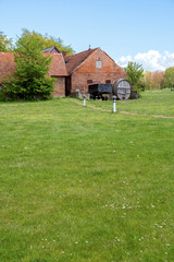 Farm house on green field in south Sweden