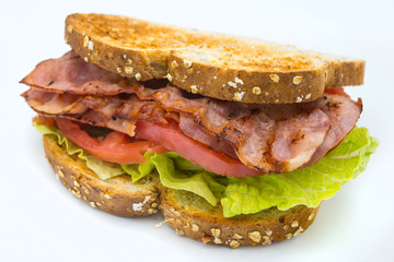 A BLT is a type of sandwich, named for the initials of its primary ingredients, bacon, lettuce and...