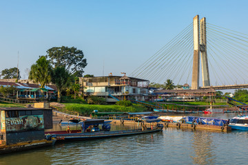 View of the bridge of El Coca on the Napo River. Puerto Francisco de Orellana. Ecuador. Amazon....