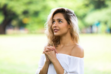Naklejka premium Freedome Happy young beautiful Woman Enjoying life at Nature park concept.