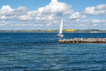 sailboat sails near Sweden on the Baltic Sea