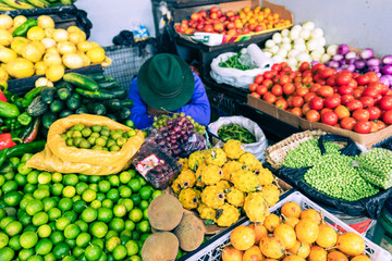 Traditional ecuadorian food market selling agricultural products and other food items in Cuenca,...