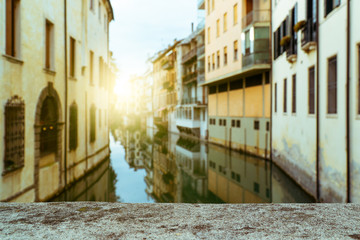 Fototapeta na wymiar Romantic landmark street cityscape with tourist attraction small lovely town village in Europe italy with narrow ally old historical architecture houses buildings background with canals and bridge