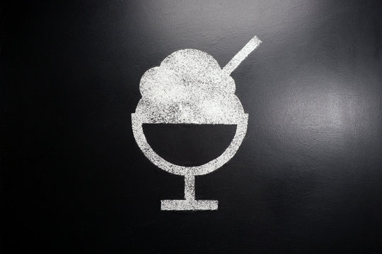 Ice cream. Drawing on a black chalkboard