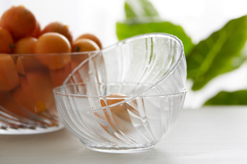 Glass fruit tray with little kumquat