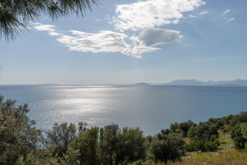 Fototapeta na wymiar Relaxing colorful seascape with view on mountains of Peloponnese, Greece