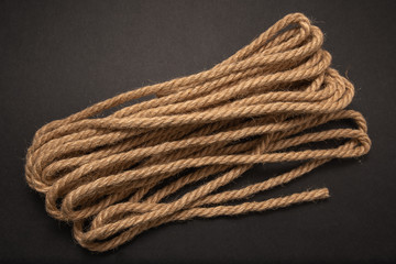 brown thick rope, rope on black background
