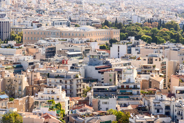View of Athens from  Acropolis. The Old Royal Palace - first royal palace of modern Greece. It has housed the Hellenic Parliament.