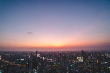 Obraz premium Aerial view of Bangkok city at sunset, from Mahanakhon SkyWalk, Thailand, Asia