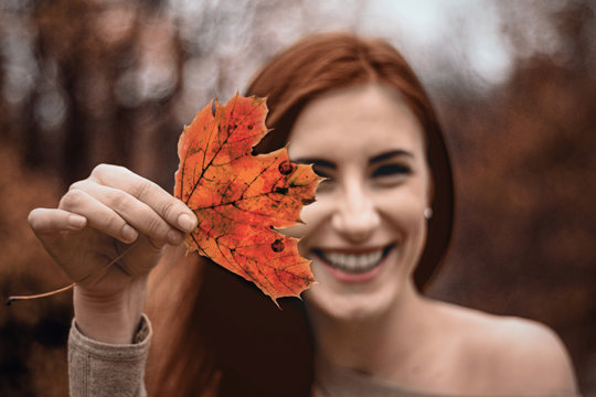 A Happy Girl Relaxed In Forest Automn