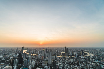 Fototapeta premium Aerial view of Bangkok city at sunset, from Mahanakhon SkyWalk, Thailand, Asia