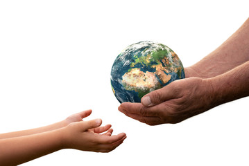 Close up of senior hands giving small planet earth to a child isolated on white background