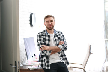 Portrait of male designer in office. Creative profession