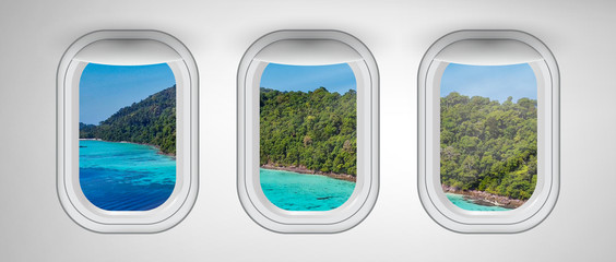 Airplane windows with Surin Islands view, Thailand. Travel and holiday abstract concept