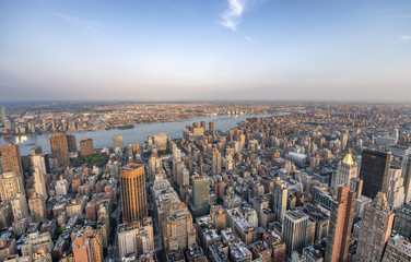 Sunset aerial view of Midtown Manhattan skyscrapers from a high viewpoint, New York City, USA