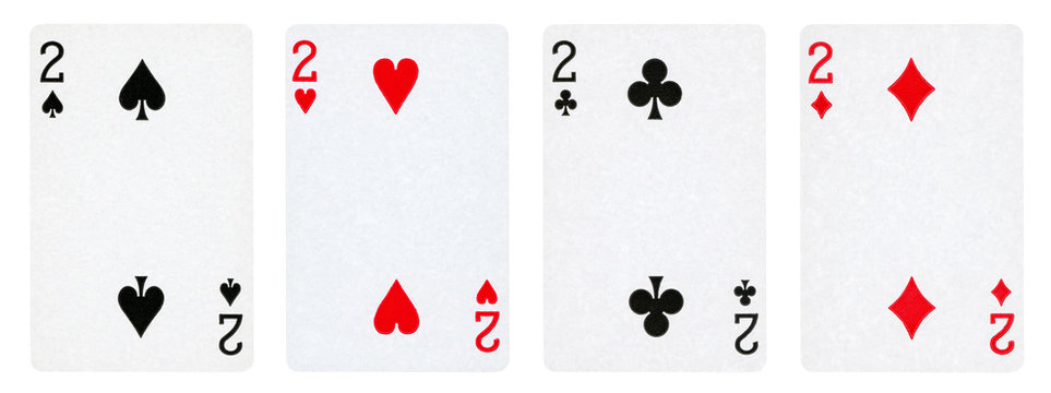 Four Playing Cards Isolated on White Background, Showing Two from Each Suit - Hearts, Clubs, Spades and Diamonds.