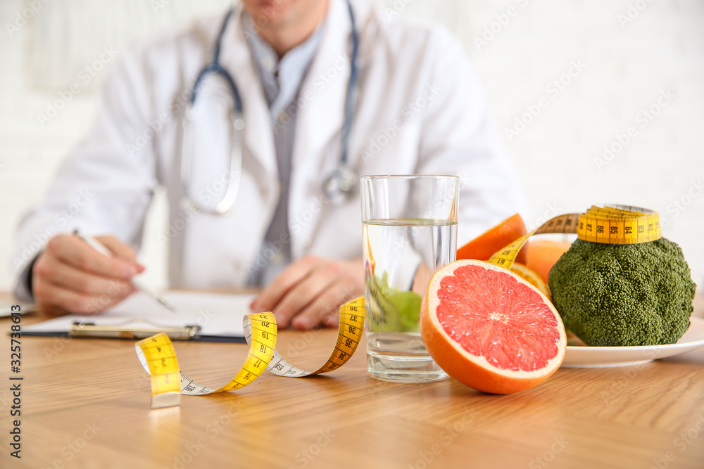 Poster Healthy products, measuring tape and blurred nutritionist on background