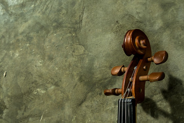 violin on concrete background. vintage style.