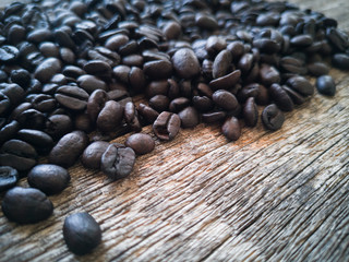 Coffee beans on rustic wood