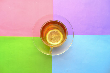 Close up of green tea on color background 