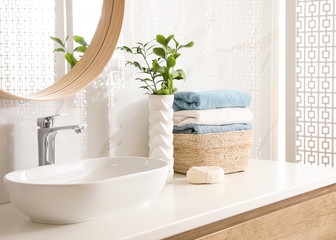 Stylish bathroom interior with mirror and countertop. Design idea - Powered by Adobe