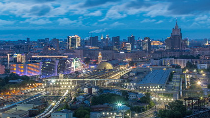 Panoramic view to Kiev Railway Station night to day timelapse and modern city in Moscow, Russia
