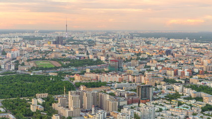 Fototapeta na wymiar Aerial top view of Moscow city timelapse at sunset. Form from the observation platform of the business center of Moscow City.