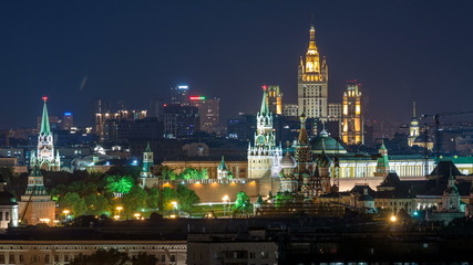 Plakat Panoramic view of Moscow timelapse - Kremlin towers, State general store, Stalin skyscraper, residential building at night