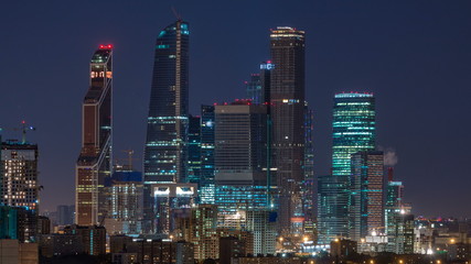 Fototapeta na wymiar Moscow international business center Moscow City timelapse at night. Urban landscape metropolis night with skyscrapers
