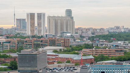 Moscow cityscape from rooftop timelapse. Residential buildings and Ostankinskaya tv tower. Aerial view from the roof