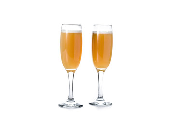 Bellini champagne cocktail in glass isolated on white background