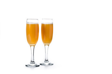 Bellini champagne cocktail in glass isolated on white background. Copy space