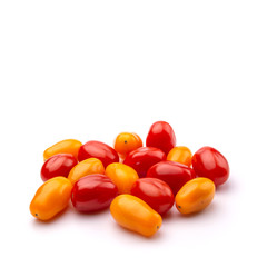 yellow, red and brown cherry tomatoes on a white isolated background