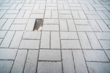 Stone paving with a hole