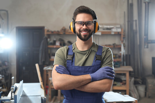 Portrait of professional male carpenter in workshop - Powered by Adobe